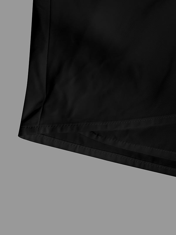 Draped jacket with an asymmetric fold-over front and stand collar