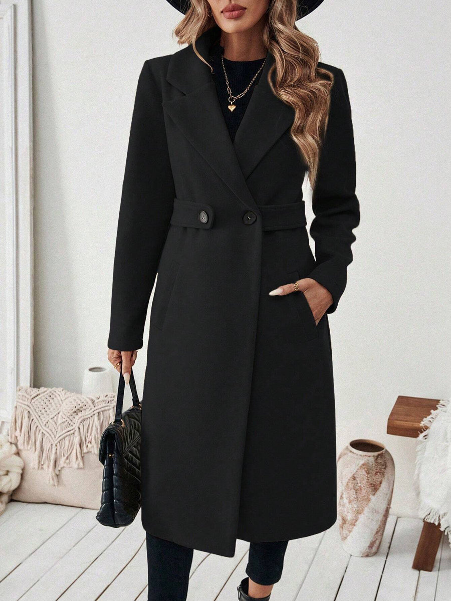 Longline coat with a wide notch lapel and a button at the waist