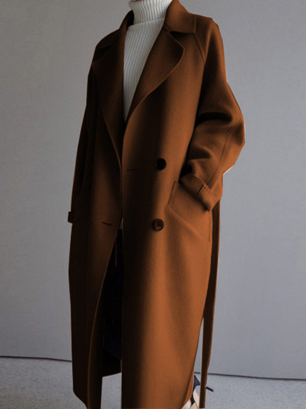 Belted longline coat with a notch lapel and welt pockets