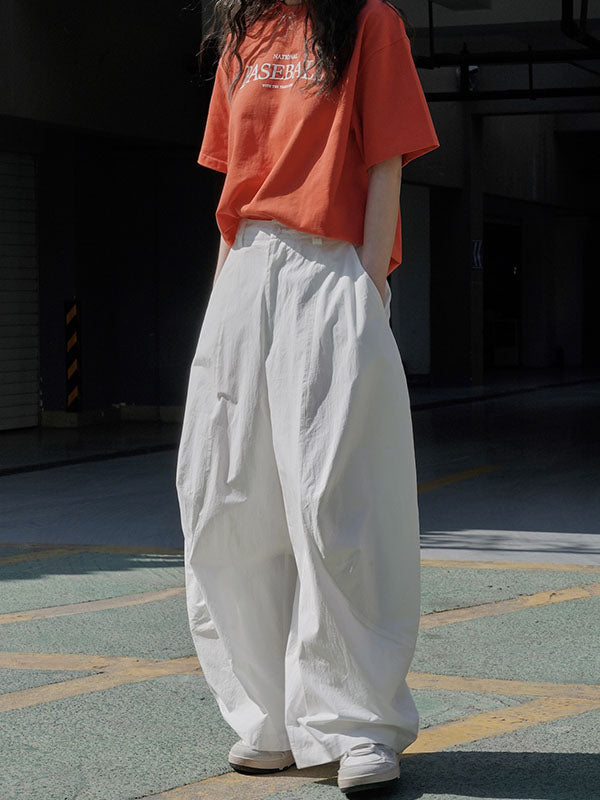 Wide-leg barrel trousers in cotton with curved knee seams