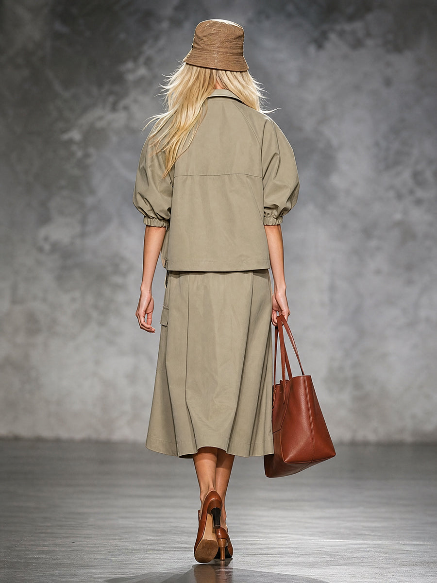 Khaki jacket with rust contrast piping and gathered puff sleeves