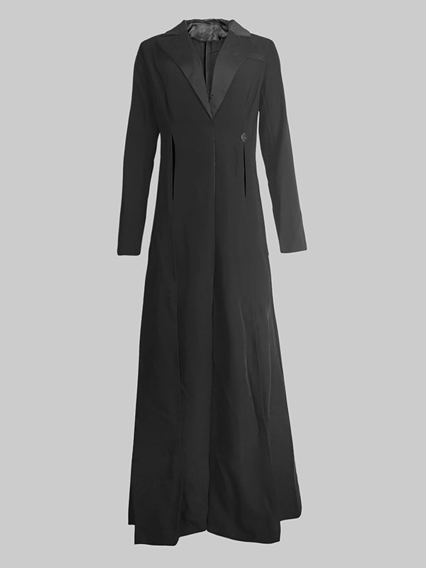 Floor-length black coat with a satin peak lapel and side splits
