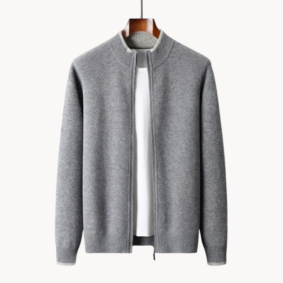 Zip-up cardigan showing contrast tipping at the collar