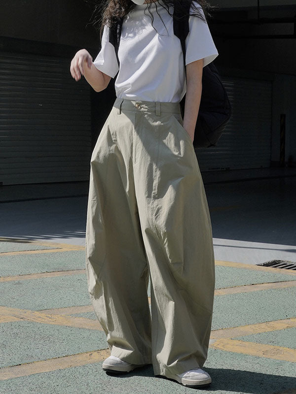 Wide-leg barrel trousers in cotton with curved knee seams