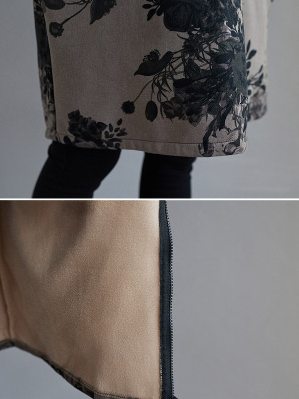 Grey hooded jacket printed with dark flowers and a full-length zip