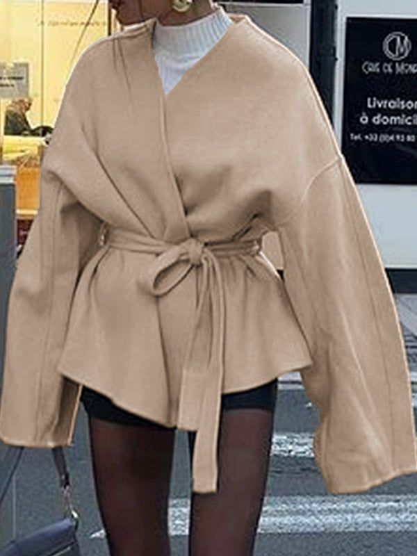 Short wrap coat with a deep V-neck and a self-tie belt