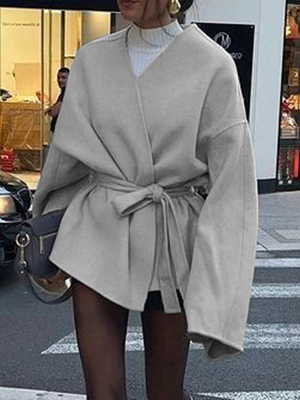 Short wrap coat with a deep V-neck and a self-tie belt
