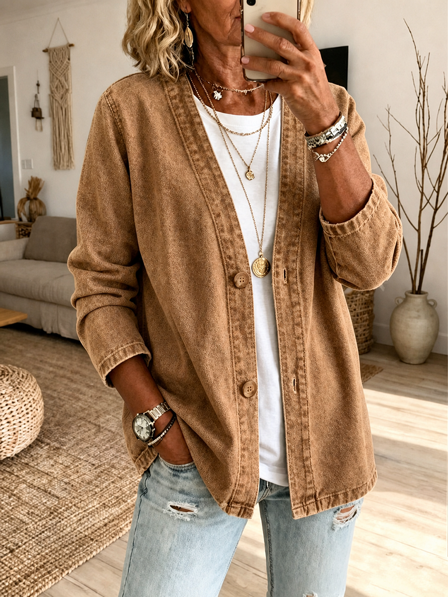 Collarless denim jacket with a button front and dropped shoulder in brown