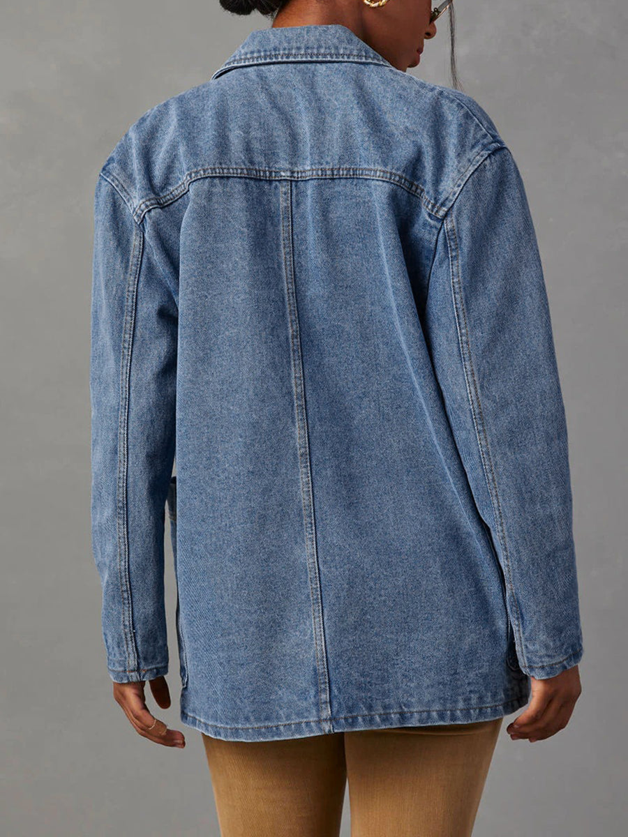 Mid wash denim blazer with a notched collar and four patch pockets