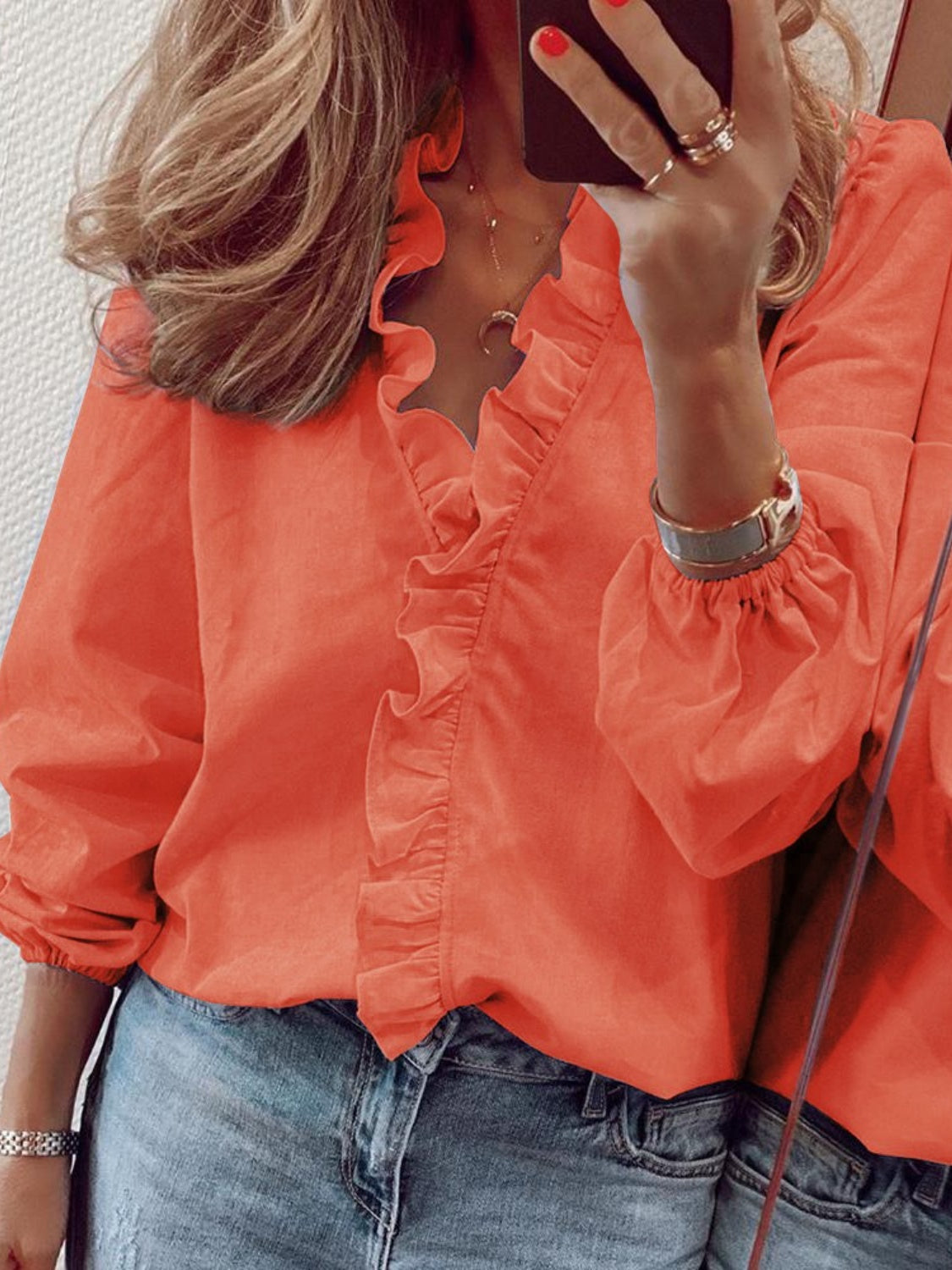 Women's ruffled V-neck blouse in Pumpkin