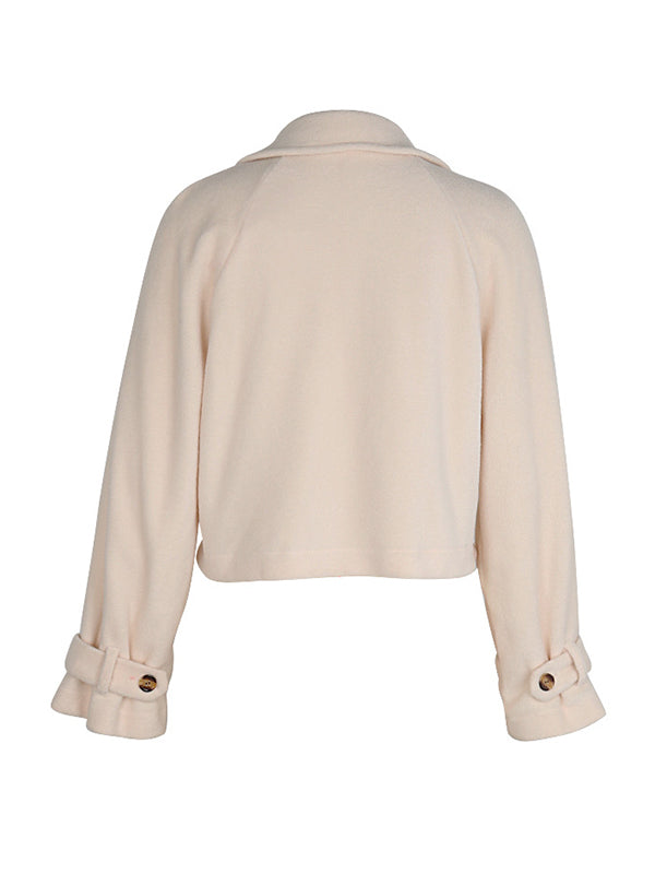 Cream cropped fleece jacket with a wide lapel and two rows of buttons