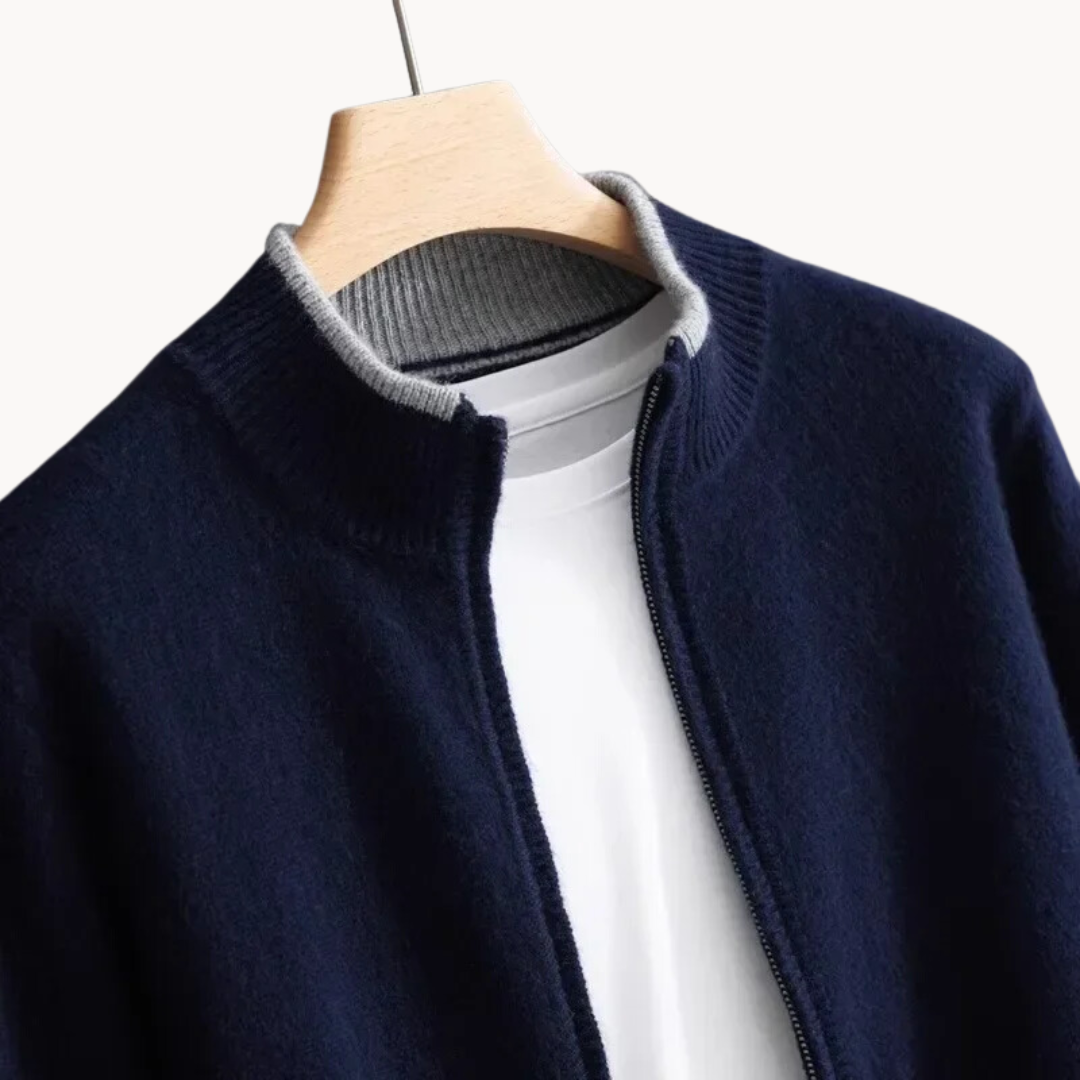 Zip-up cardigan showing contrast tipping at the collar