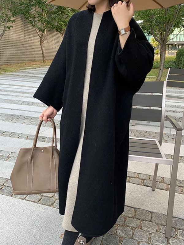 Collarless longline coat with dropped sleeves and an open front