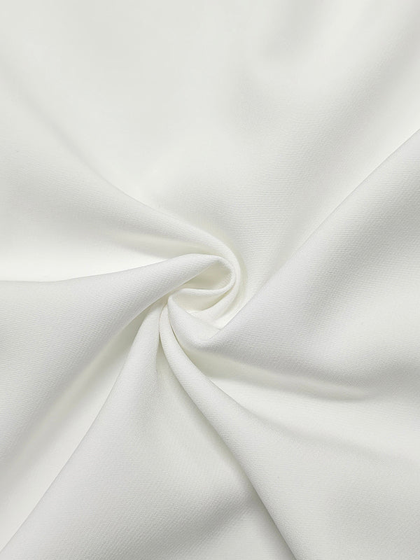 White longline blouse with a waist ruffle and flared half sleeves