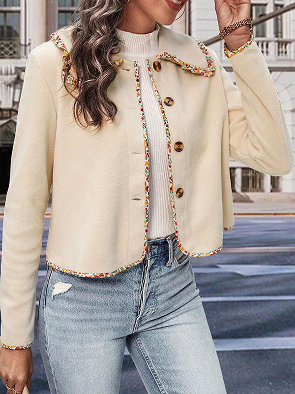 Cream cropped jacket with a multicoloured braid trim and gold-tone buttons