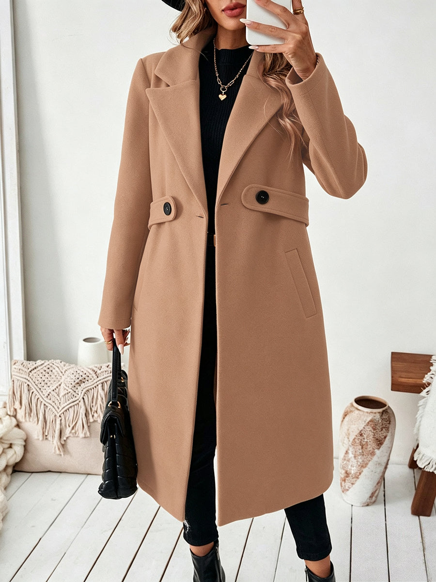 Longline coat with a wide notch lapel and a button at the waist