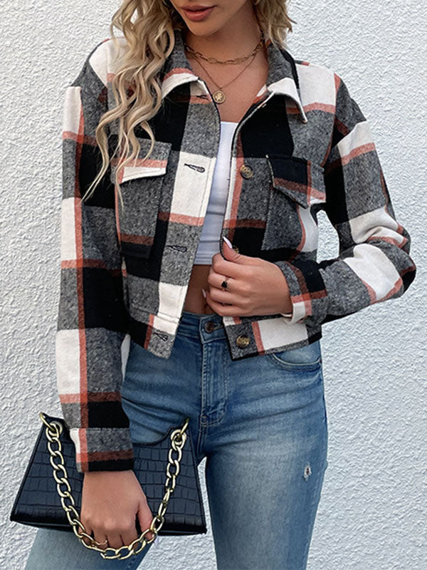 Cropped checked jacket with a pointed collar and two flap pockets in black
