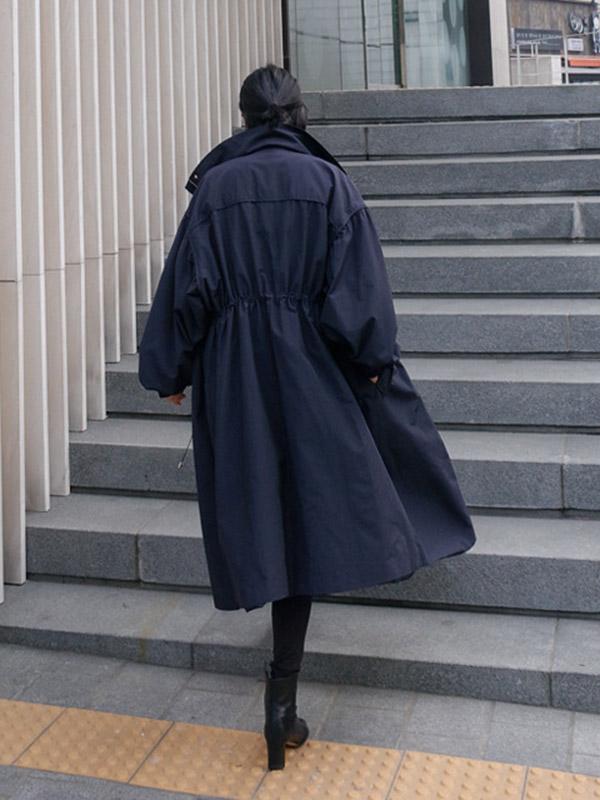 Longline hooded coat with a drawstring waist and deep pockets