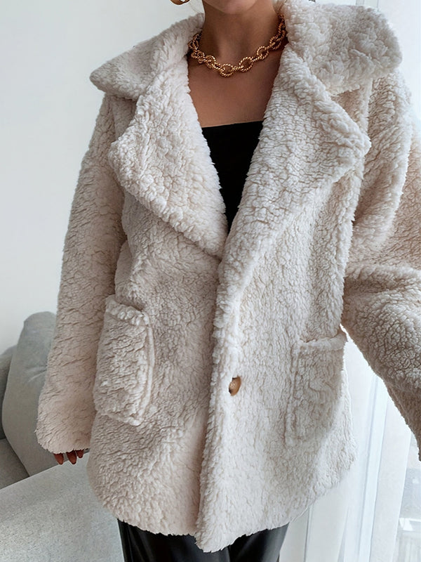 Cream teddy jacket in soft sherpa with a wide lapel and patch pockets