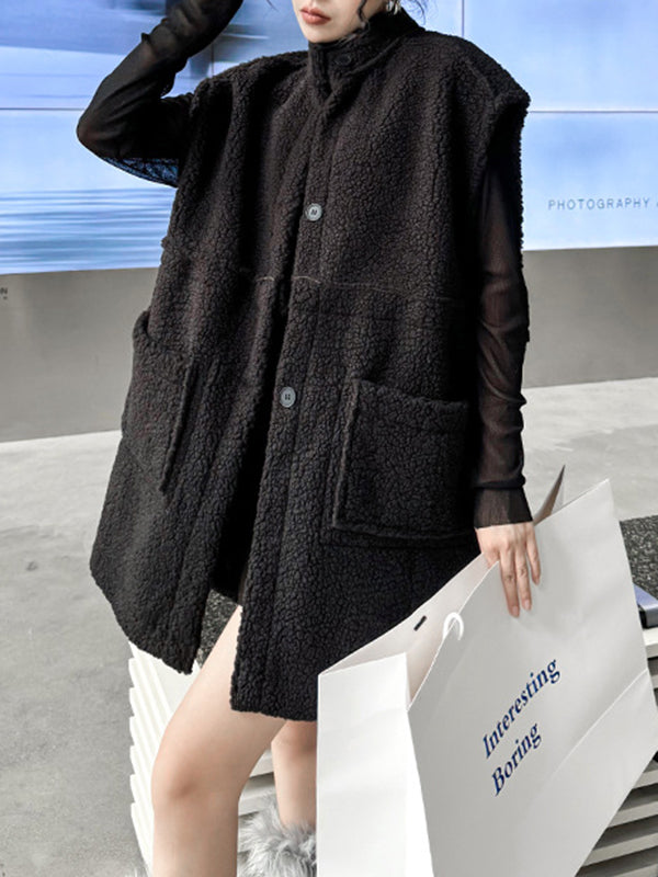 Sleeveless suede-look gilet with a dark faux shearling trim