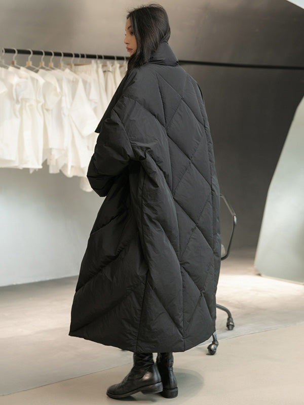 Long black padded coat with a scarf collar and diagonal quilting