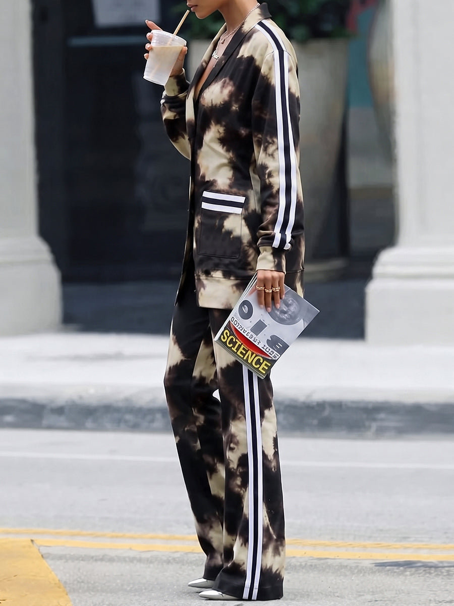 Tie-dye cardigan in black and cream with striped sleeves
