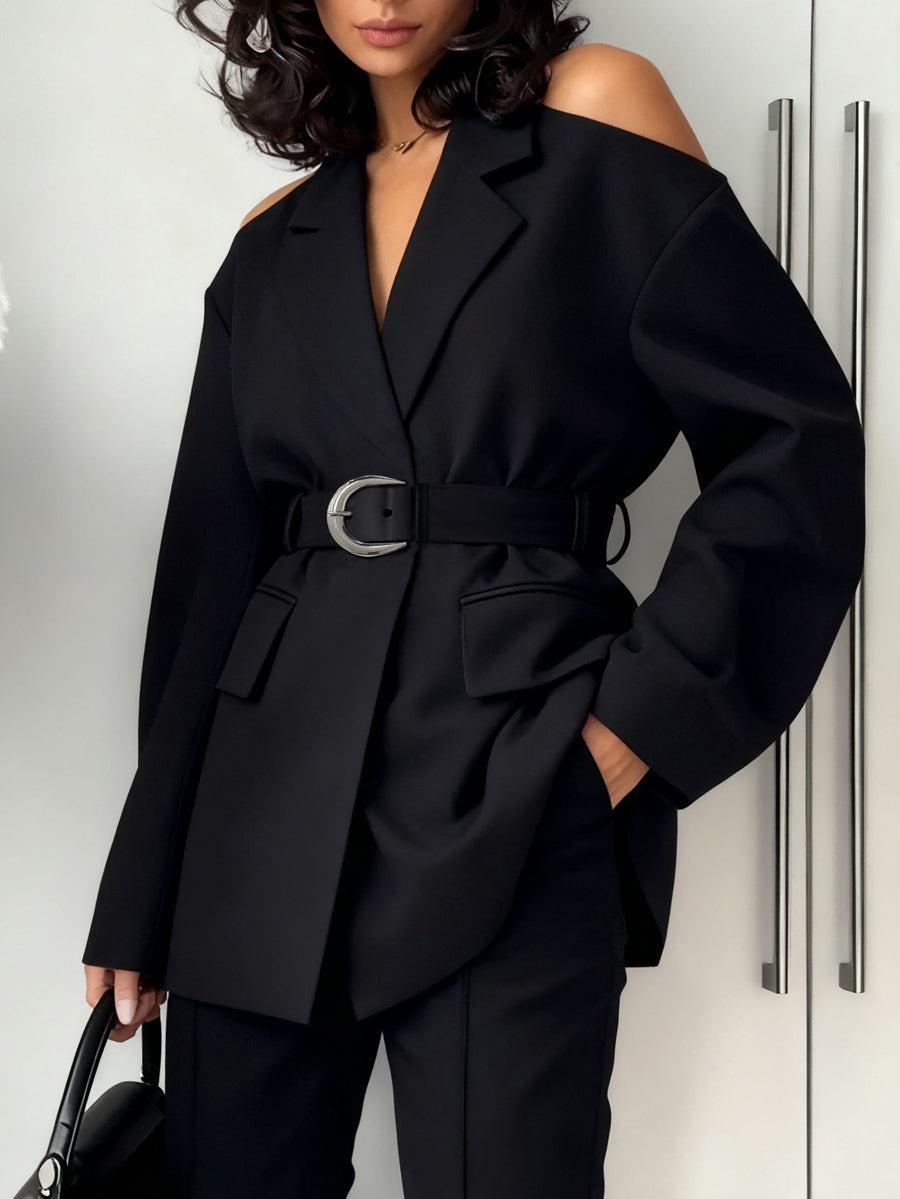 Oversized black blazer with cut-out shoulders and a buckled belt in black