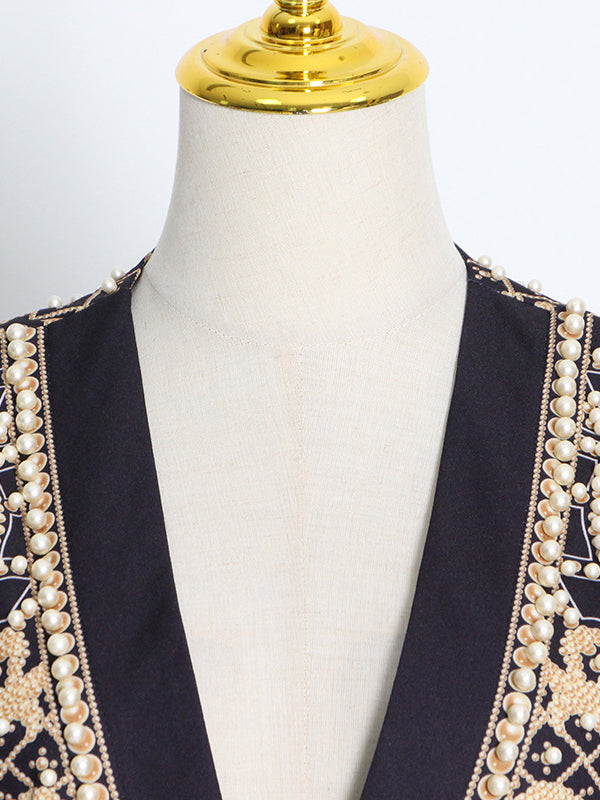 Beaded blazer with an ornamental pattern and a deep V-neck