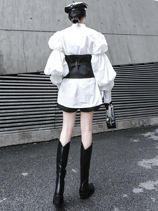 Strapless black cropped waistcoat with a button front and back belt