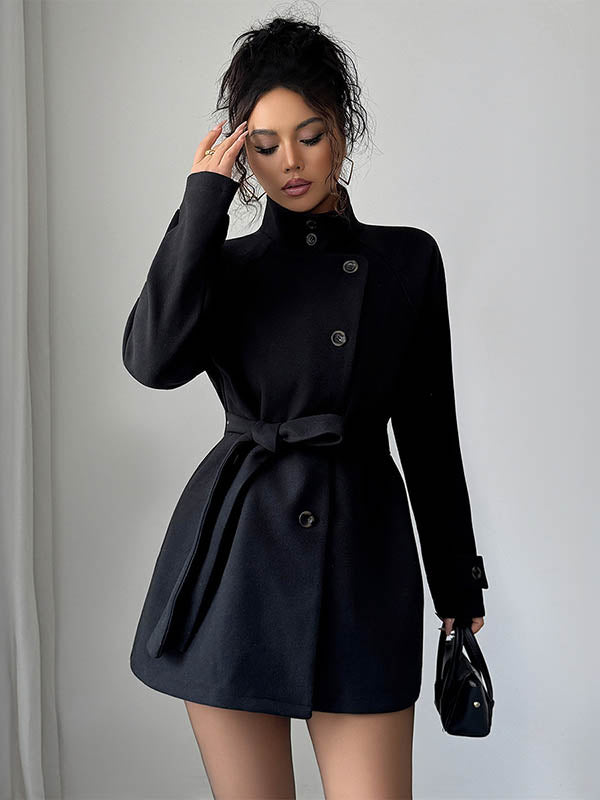 Short belted coat with a stand collar and an asymmetric button front