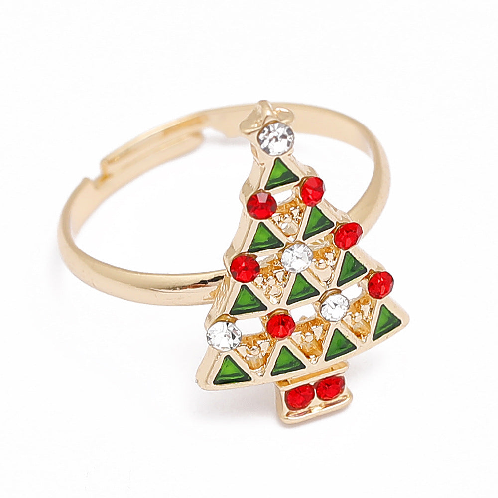 Adjustable gold-tone Christmas ring with an open band and a festive motif - green tree with stones