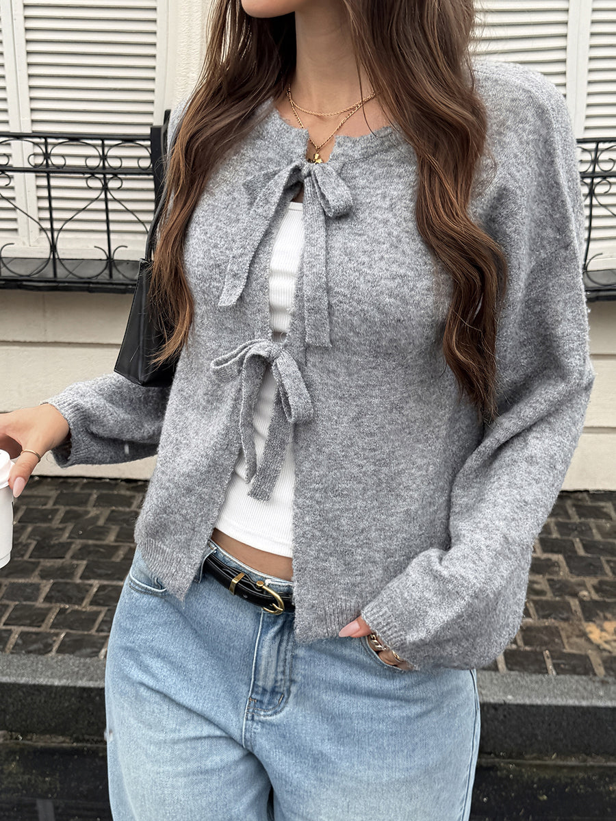 Soft grey knitted cardigan with a tie fastening at the neck in grey