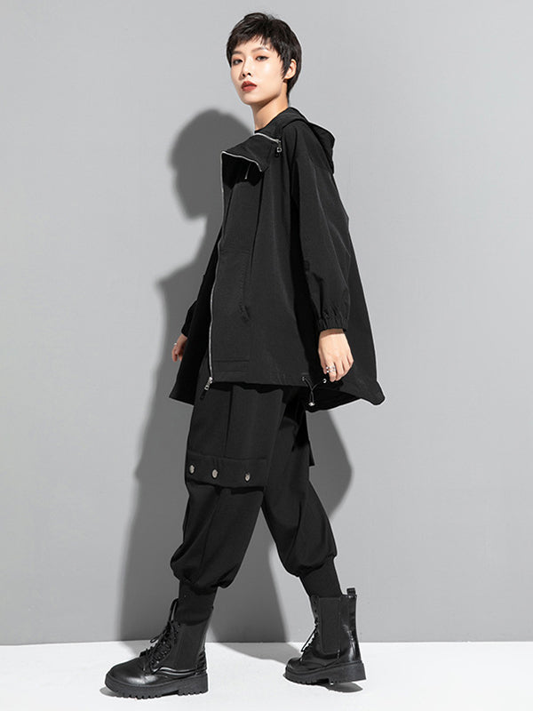 Oversized black hooded jacket with an off-centre zip and drawstring hem