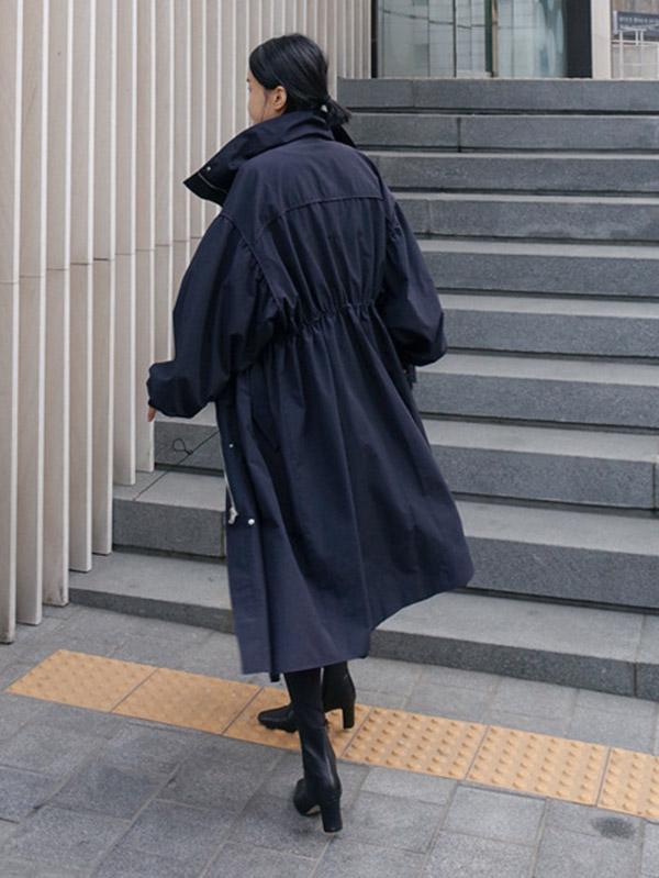 Longline hooded coat with a drawstring waist and deep pockets