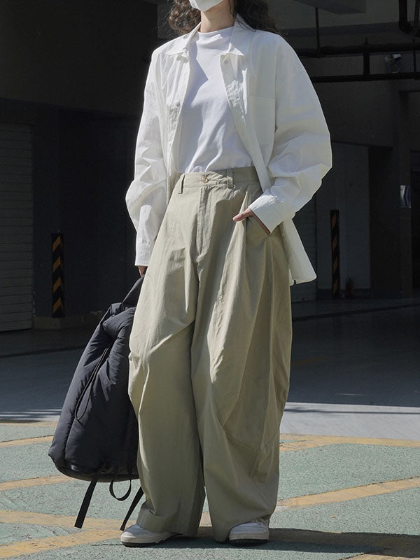 Wide-leg barrel trousers in cotton with curved knee seams