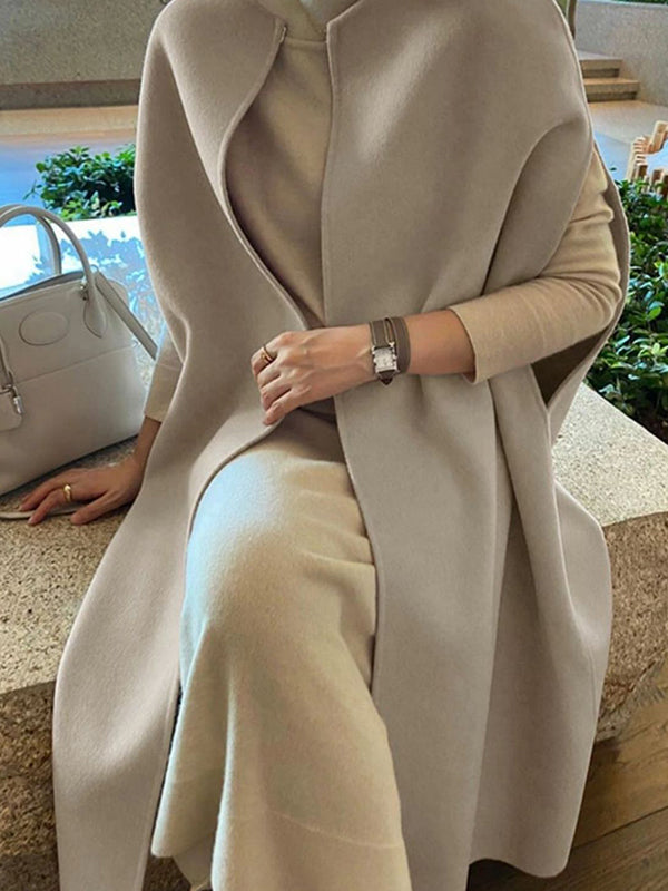 Sleeveless wool-blend cape with a round neck and a curved hem