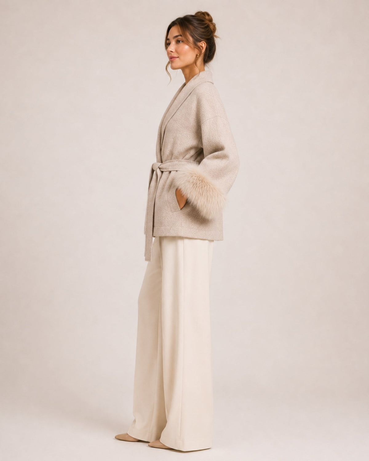 Women's belted wrap cardigan with a shawl collar and fluffy cuffs