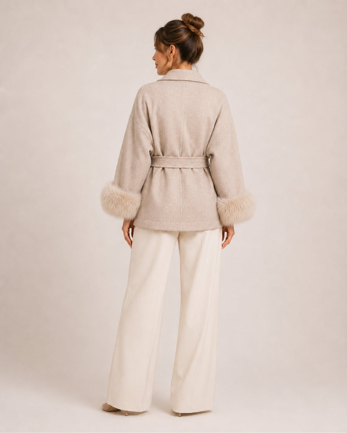 Women's belted wrap cardigan with a shawl collar and fluffy cuffs