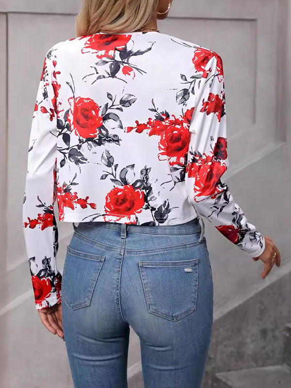Cropped jacket printed with red roses on white with an open front