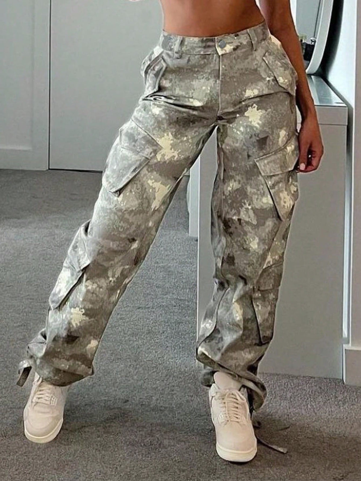 Camo cargo trousers for women with flap pockets on both legs and a long straight leg - light camo