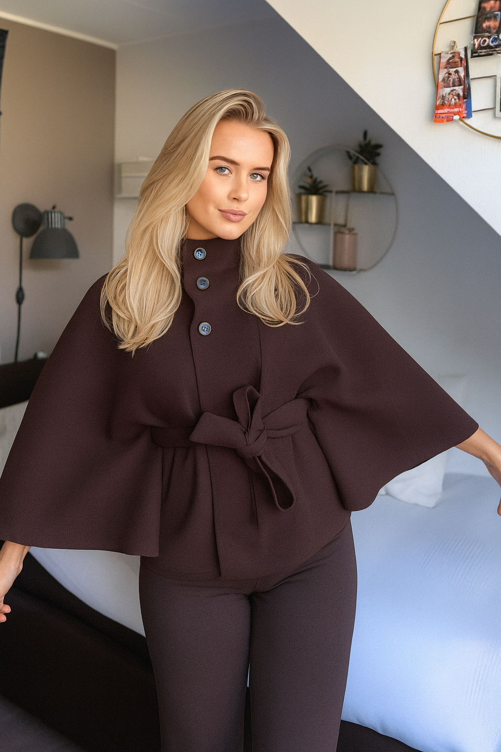 Women's cape coat with a high collar and tie belt
