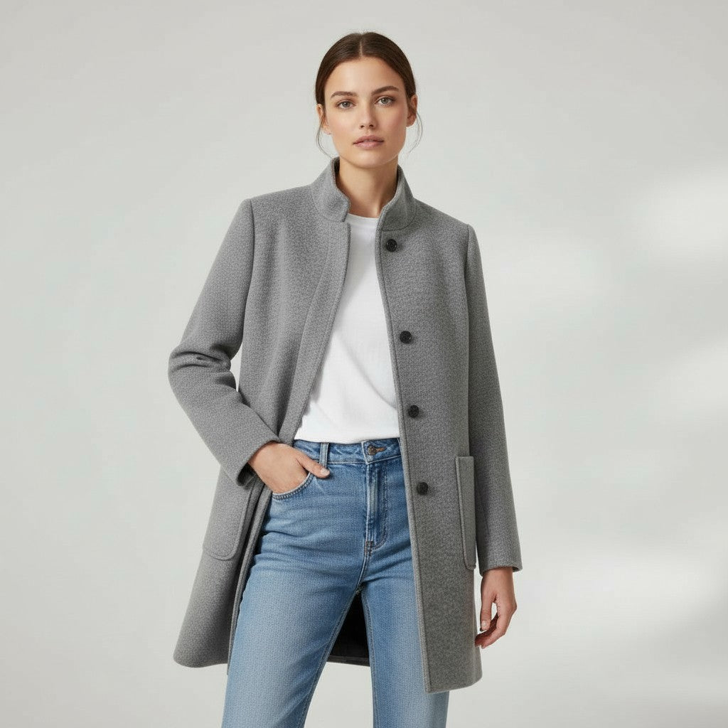 Knee-length single-breasted coat with a stand collar and patch pockets