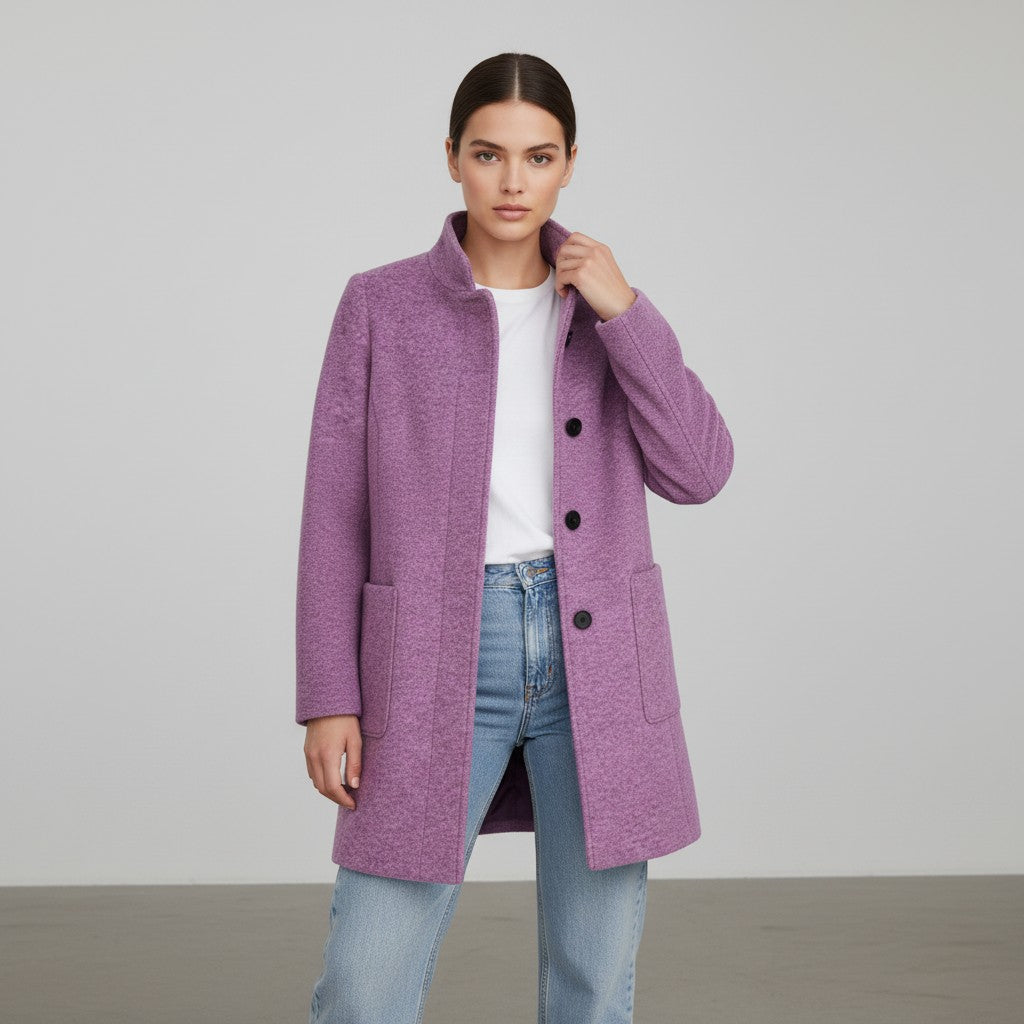 Knee-length single-breasted coat with a stand collar and patch pockets in pink