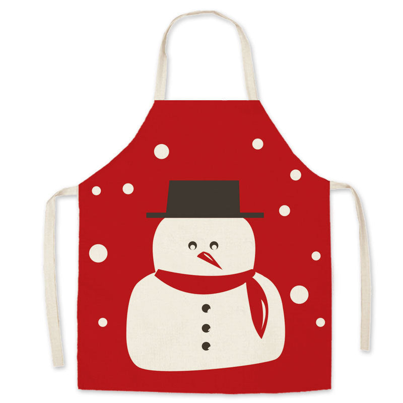 Red Christmas apron with a neck loop, long ties and a festive print on the front - snowman with scarf