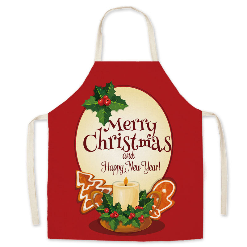 Red Christmas apron with a neck loop, long ties and a festive print on the front - candle with merry christmas