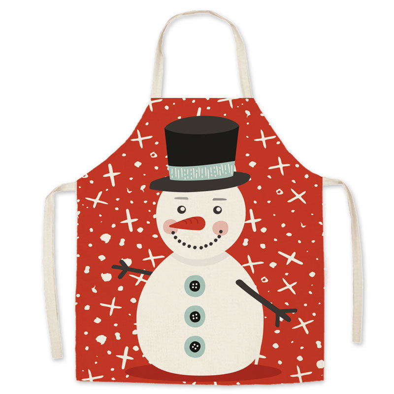 Red Christmas apron with a neck loop, long ties and a festive print on the front - snowman in top hat