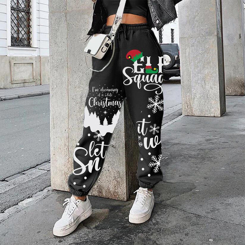 Women's Christmas joggers with elastic waist, cuffed ankles and festive print