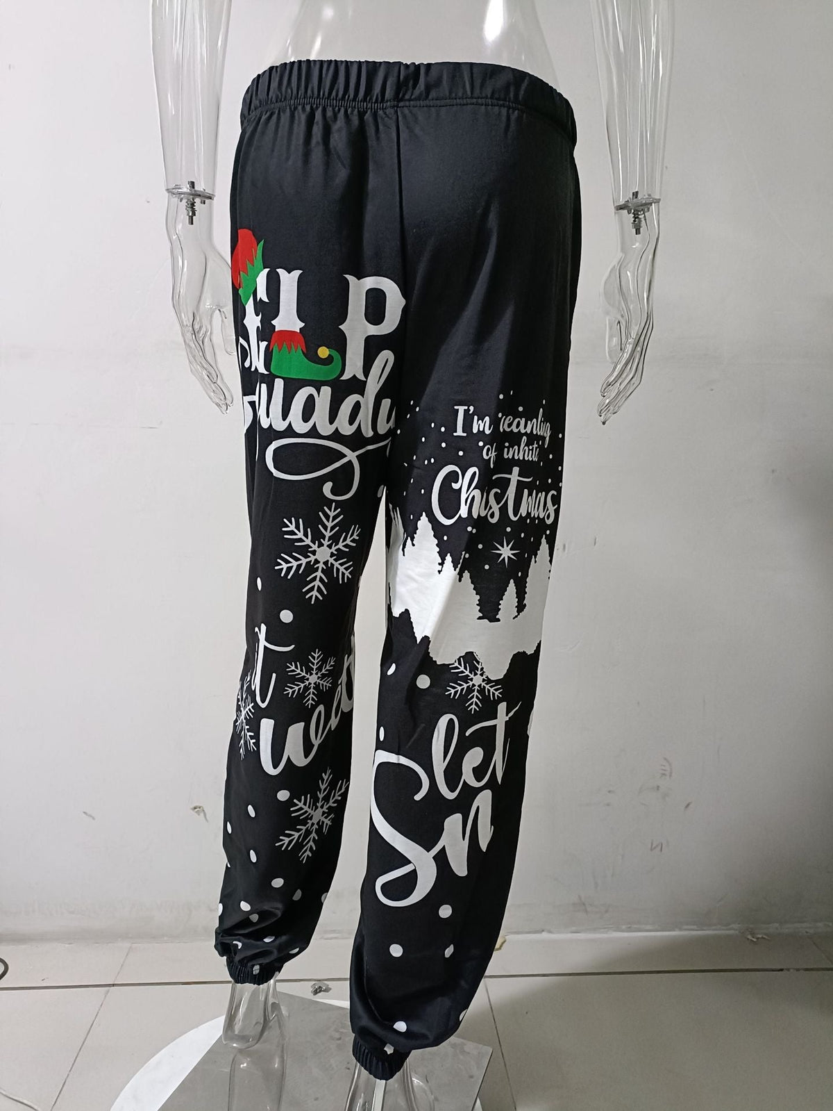 Women's Christmas joggers with elastic waist, cuffed ankles and festive print