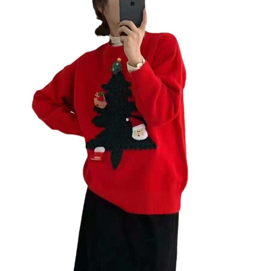 Women's knitted Christmas jumper with a raised 3D tree and small appliqués