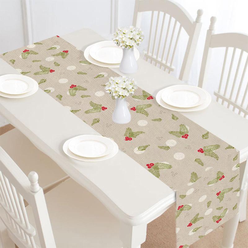Christmas table runner, 30 x 180 cm, with a festive print on a laid table - beige with berries and leaves
